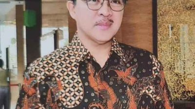 Dr. Agus Nompitu, S.E., M.T.P. (Ketua ISEI Cabang Lampung)